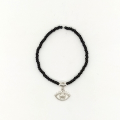 Pulsera Mostacilla Checa Negra + Dije Verás