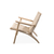 Poltrona CH 25 Lounge Chair Rattan en internet