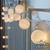 Guirnalda tipo Kermesse Led Blanco Calido 9mts / 100 luces 100 pelotitas en internet