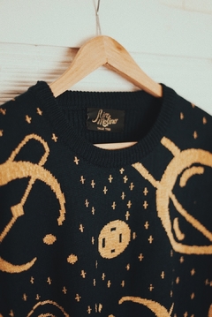 Sweater saturno en internet