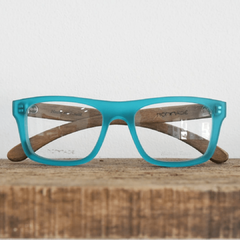 anteojos de madera (patillas) y acetato (frente) color turquesa con forma rectangular para lentes de aumento modelo Berna marca Nomade frente