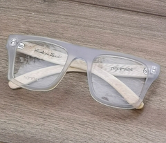 anteojos de madera (patillas) y acetato (frente) color cristal de forma rectangular para colocar lentes de aumento modelo Milan marca Nómade