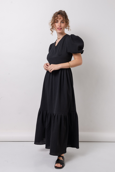 Vestido largo con mangas globo y espalda descubierto