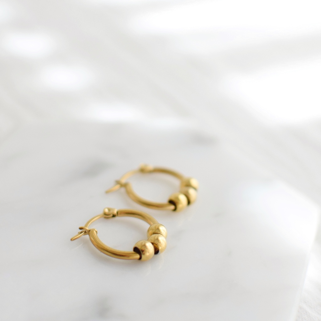 Argollas Pippa Acero quirurgico dorado HENNEDIAS
