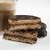 Alfajor cubierto de Chocolate Negro relleno con Dulce de Leche x 6u. - comprar online