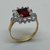 Anillo de Oro 18kls Amarillo y Cuerpo de Plata 925. Rubi Centrasl y Circoñas. - comprar online