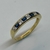 Anillo Realizado en Oro Amarillo 18klts y Circoñas y Zafiro Carre. Medio sin Fin. - comprar online