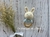 Imagen de Sonajero conejo tejido mordillo madera natural