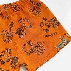 Conjunto chaleco + short PEZ naranja en internet