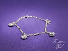 P 583 - Pulsera de Plata 925 - Cadena Roló alargado (3 mm) con 4 dijes (Delfín - Corona - Sol y Trébol) de Plata inflada (10 mm)