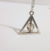 Collar Harry Potter - Reliquias de la muerte con centro giratorio - Producto oficial - comprar online