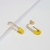 Aros clip yellow (dorado) - Furman Jewels