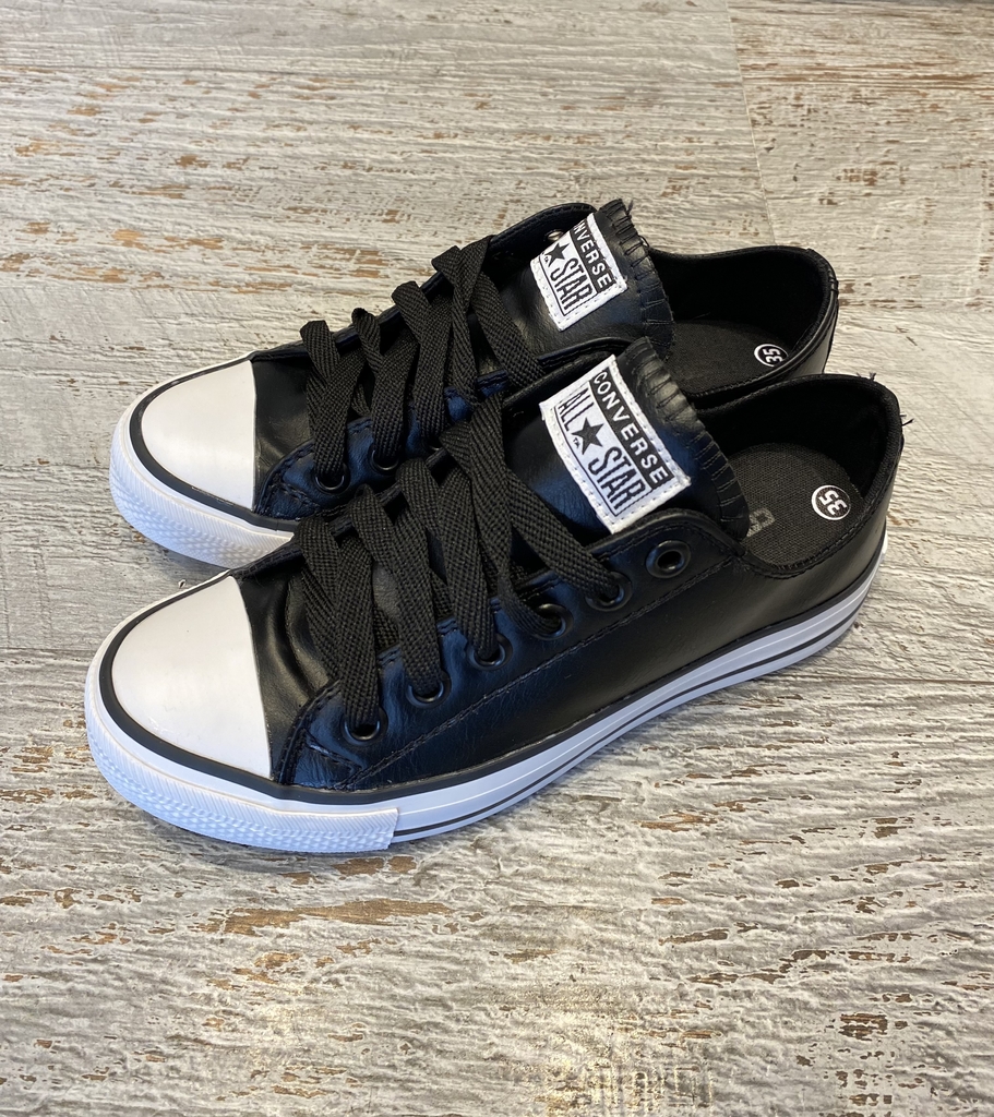 Converse de cuero bajas sale