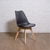 Hermosa y elegante silla Tulip negra con patas de madera paraíso | Belgrano Home
