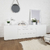 Espacio organizado con mueble de TV minimalista laqueado blanco con 3 cajones y 2 puertas organizadoras | Belgrano Home