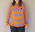 Sweater Natalie lila y naranja en internet