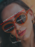 Óculos de Sol Winnie Laranja na internet