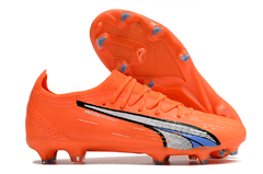 Chuteira Puma Ultra 1.3 Ultimate FG Campo Supercharge Pack