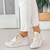 Zapatillas blancas de mujer