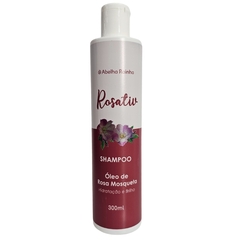 Frasco de shampoo Rosativ da Abelha Rainha, com óleo de rosa mosqueta, 300ml, destacando hidratação e brilho.