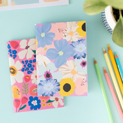 Set libretas flores lila y fucsia