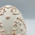 Enfeite Ovo Arabesco resina branco/rosa 12cm - comprar online