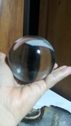 Bola de cristal k9 80mm e suporte giratório de madeira na internet