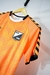 Camiseta Pre Match Central Norte Naranja Hummel 2024 en internet