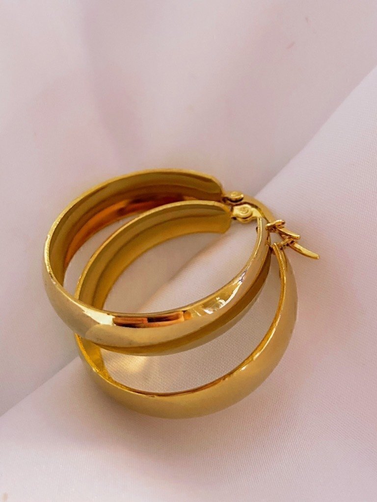 Argollas de acero quirurgico doradas sale