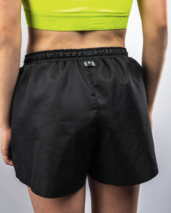 SHORT RUNNING UNISEX RACER -NEGRO- - Cozy Sport SA