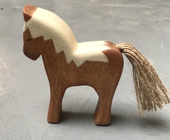 potrillo- caballo chico