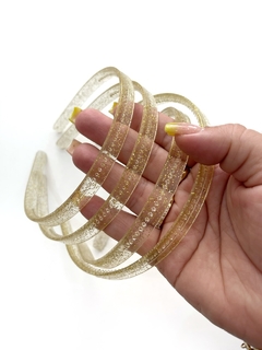 TIARA TRANSPARENTE COM GLITER DOURADO COM 06 UNIDADES na internet