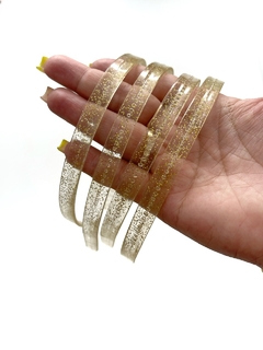 TIARA TRANSPARENTE COM GLITER DOURADO COM 06 UNIDADES - comprar online