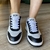 Tênis Couro Schutz Preto e branco - Quattro Calçados - Loja Online de Calçados Femininos em BH