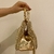 Bolsa Luz da Lua Madras Couro em Tricô Dourado - comprar online