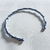 Bracelete Prateado Torcido em Aço Inox | Pistache Acessórios