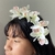 Tiara de Orquídeas Coloridas para Penteado | Pistache Acessórios