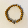 Pulsera con dije, madera - comprar online