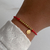 PULSERA CALYT HILO ROJO