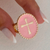 ANILLO CROSS PINK