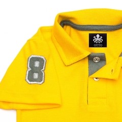 Polo Infantil Bordada Modelo Escudo Manga Curta Piquet Amarela Com Detalhes Em Cinza | Otto - comprar online