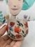 Imagem do Copo bolinha de café Mulher entre as flores