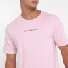 Camiseta Calvin Klein Logo Centralizado Masculina Rosa Claro - CKJM106E-0400 na internet