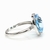 Anillo Oro Blanco 18 Kts Topacio Azul Natural y diamantes ANDT013 - comprar online