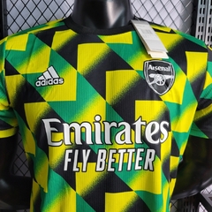 Camisa Arsenal Pré-Jogo 22/23 Jogador Adidas Masculina - Amarelo, preto e verde. na internet