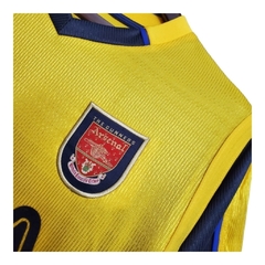 Camisa Retrô Arsenal II 99/00 - Masculina Nike - Amarela com detalhes em azul - loja online