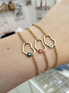 Pulsera centro corazón con ojo turco acero dorado