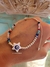 pulsera ajustable multi con ojito estrella