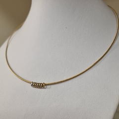 COLLAR CADENA RIGIDA ORO 18K CON DONAS DE ORO BLANCO AU257 - comprar online