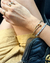 Bracelete inspiração prego liso detalhe cravejado de zircônias - comprar online